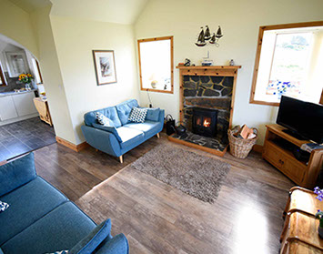 Our Self Catering Accommodation in Waternish contains a Woodburning stove and Open Plan Kitchen Living Room
